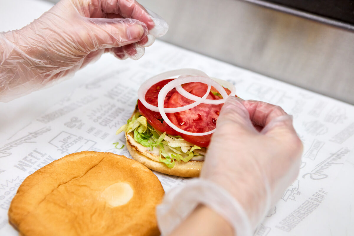 someone building a Big Pal hamburger
